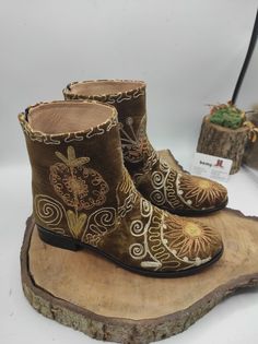 Handmade genuine leather custom made women shoes. Every size available. #ankleboots #suzaniboots #customboots #forher #handmade #bohostyle #riding #fashion #dessigner #bemyboots #etsyaddict #handmade Brown Embroidered Winter Boots, Brown Bohemian Embroidered Boots, Embroidered Snip Toe Boots For Festival, Bohemian Snip Toe Winter Boots, Bohemian Winter Boots With Snip Toe, Brown Embroidered Round Toe Boots, Brown Embroidered Boots With Round Toe, Bohemian Winter Snip Toe Boots, Embroidered Winter Festival Boots