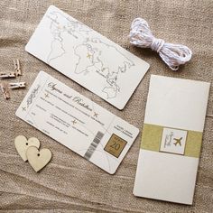 wedding stationery with luggage tags and pins