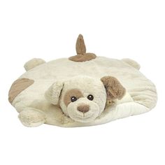 a stuffed animal laying on top of a white pillow with brown ears and nose shapes