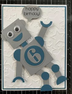 a birthday card with a robot on it