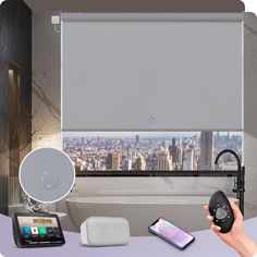 a person holding a remote control in front of a window with cityscape on it