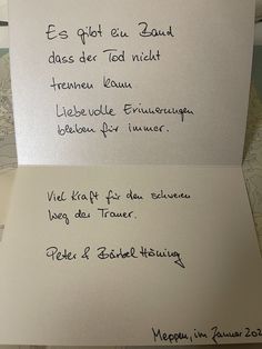 two pieces of paper with writing on them