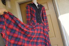 90s plaid dress. Buttons in the front. Labeled size 11/12. Made by Temtex.  Has small shoulder pads and pockets!! Condition - is worn with light pilling and fading. measurements taken across front laid flat18.5" across front armpit to armpit15" across front of waist28" hips51" length Collared Fitted Plaid Dress, Fitted Plaid Collared Dress, Fitted Collared Plaid Dress, Fitted Plaid Dress With Buttons, Collared Cotton Plaid Dress, Plaid Cotton Dress With Buttons, 90s Plaid Dress, Dress Buttons, Medium Dress