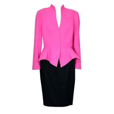 Hot pink wool gabardine suit by Thierry Mugler. Fiited waist with gently sloped peplum with pink snap closures at waist and wrist. Black gabardine slim skirt. Jacket Waist 29", 16" to Waist, 22" to hem. Overarm measure 29". Bust 36". Skirt: Waist 26", Hip 35", Length 22". Size 40 EU Very Good condition. Pink Lawyer Outfit, Chic Fitted Pink Skirt Suit, Chic Pink Skirt Suit For Formal Events, Chic Pink Skirt Suit For Formal Occasions, Pink Long Sleeve Skirt Suit For Work, Pink Fitted Business Outerwear, Pink Fitted Outerwear For Business, Fitted Pink Outerwear For Business, Pink Fitted Skirt Suit For Workwear