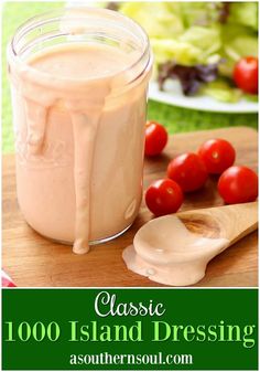 a close up of a jar of food on a table with tomatoes and lettuce