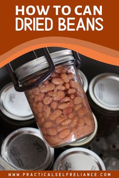 canned beans in a glass jar with text overlay reading how to can dried beans