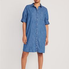 Spread Collar Elbow-Length Sleeves Full-Button Front Patch Pocket 100% Cotton Machine Wash According To The Care Instruction Label Casual Button-up Shirt Dress With Rolled Sleeves, Medium Wash Button-up Dress For Daywear, Casual Button-up Dress With Rolled Sleeves, Casual Collared Denim Dress, Relaxed Fit Denim Blue Shirt Dress With Pockets, Casual Short Sleeve Denim Shirt Dress, Relaxed Fit Button-up Dress With Rolled Sleeves, Casual Denim Shirt Dress With Short Sleeves, Cotton Medium Wash Buttoned Shirt Dress