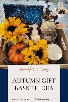 an autumn gift basket with sunflowers and other items