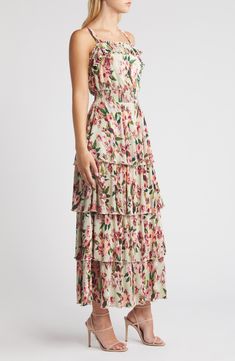 Move sweetly from day to night in this flowery maxi accented with floaty ruffles and fine pleats. 52 1/2" length (size Medium) Slips on over head Square neck Sleeveless Side-seam pockets Partially lined 100% polyester Hand wash, dry flat Imported Maxi Length Ruffled Skirt Dress For Garden Party, Feminine Ruffled Maxi Dress For Garden Party, Feminine Maxi Dress With Ruffled Skirt For Garden Party, Garden Party Maxi Dress With Ruffled Skirt, Spring Feminine Maxi Dress With Ruffled Skirt, Feminine Spring Maxi Dress With Ruffled Skirt, Pink Ruffled Skirt Maxi Dress For Spring, Feminine Ruffled Skirt Maxi Dress For Spring, Spring Floor-length Maxi Dress With Ruffle Hem