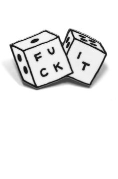 two white dices with the words fut and it spelled out in black ink