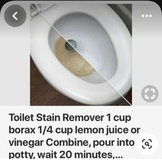 an image of a toilet that has been removed from the bowl and is being used to clean it