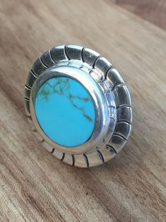 Large Aztec design Turquoise Silver ring, this listing is size 7 more sizes available. 3 cm diameter Adjustable Turquoise Round Ring, Adjustable Cabochon Turquoise Ring, Adjustable Turquoise Cabochon Ring, Adjustable Round Cabochon Turquoise Ring, Southwestern Adjustable Turquoise Ring, Nickel Free Turquoise Ring, Nickel-free Turquoise Ring, Handmade Turquoise Round Ring, Nickel-free Southwestern Style Rings