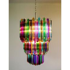 a multicolored chandelier hanging from a ceiling