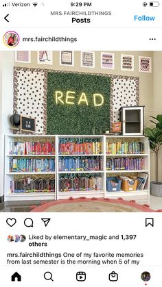 an image of a room with bookshelves and pictures on the wall above it