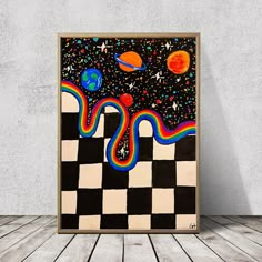 a painting on a wall with a checkerboard pattern and planets in the background