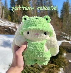 a hand holding a green crocheted stuffed animal with the words pattern release written above it