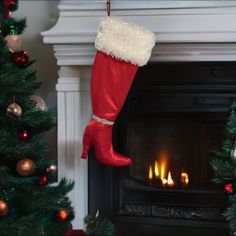 a christmas stocking hanging from a fireplace