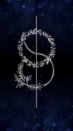 the letter s is made up of flowers and leaves on a dark background with stars