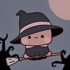 a cute little witch sitting on top of a broom