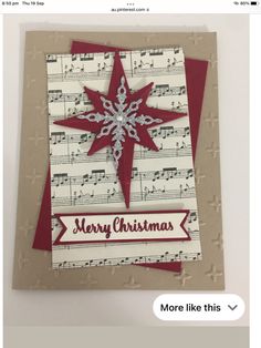 a christmas card with music notes and a snowflake