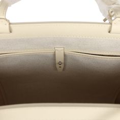 This 2024 Limited Edition Bellechasse Biaude PM bag is of sand Goyardine coated canvas and sand chevroches calfskin leather with palladium hardware, featuring two sand flat leather top handles and trim, a removable closure clip, and tonal stitching.The interior is lined in white natural canvas and has one interior floating pocket on the front wall.Origin: FranceCondition: New and never worn (plastic on handles)Accompanied by: Dustbag, closure clip and carebookMeasurements: 10.6" x 5.9" x 14.1"; Beige Textured Leather Top Handle Satchel, Luxury Cream Textured Leather Shoulder Bag, Classic Beige Epsom Leather Shoulder Bag, Cream Epsom Leather Bag For Everyday Use, White Epsom Leather Travel Bag, Luxury Beige Epsom Leather Shoulder Bag, Luxury Beige Textured Leather Satchel, Classic Cream Textured Leather Bag, Luxury Neutral Bags