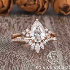 an engagement ring set with a pear shaped diamond