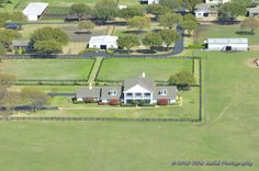 an aerial view of a house with a woman's face in the middle of it