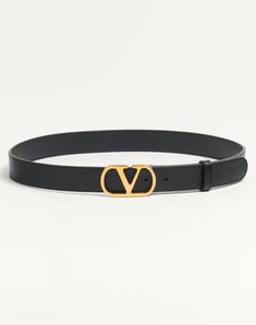 Valentino Garavani VLogo Signature belt in shiny calfskin. - Vlogo Signature buckle in antique brass finish - Shiny calfskin exterior - Calfskin interior - Dimensions: H.30 mm / 0.78 in. - Made in Italy Classic Leather Belt With Gold-tone Logo Plaque, Elegant Gold-tone Logo Plaque Belt Buckle For Formal Occasions, Gold Leather Belt Buckle With Logo Plaque, Gold Leather Belts With Gold-tone Logo Plaque, Elegant Business Belt With Gold-tone Logo Plaque, Luxury Gold Belt Buckles With Metal Logo, Designer Formal Belt With Gold-tone Logo Plaque, Classic Evening Belts With Gold-tone Hardware, Luxury Gold-tone Belt Buckle For Formal Wear