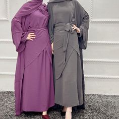 This 3 piece dress is fully lined and non see through that needs no occasion. Surely the most versatile outfit that can mix and match with anytime. Includes a long sleeve inner slip dress, an open abaya, and a wrap skirt. Made of premium crepe material. Spring Long Abaya, Elegant Long Sleeve Summer Abaya, Elegant Long Purple Dresses, Purple Long Maxi Dress For Fall, Purple Maxi Dress For Fall, Purple Maxi Dress For Eid, Elegant Solid Color Dresses For Eid, Elegant Purple Maxi-length Abaya, Purple Long Sleeve Dress For Eid