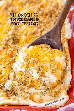 a close up of a spoon in a casserole dish with cheese and bread crumbs