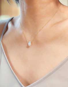 * This dainty pearl necklace showcases an oblong shape baroque pearl delicately wire-wrapped to your choice of a sterling silver chain or a 14k gold-filled chain. Each pearl is fabulous with its uniqueness in shape and iridescence. Chic and versatile, this minimalist pearl necklace is perfect for wearing alone or layered with other necklaces.  * Pearl is the birthstone for the month of June and is also a traditional wedding gift. This beautiful necklace will definitely be perfect as birthday gif Traditional Wedding Gifts, Necklaces Pearl, Dainty Pearl Necklace, Single Pearl Necklace, Real Pearl Necklace, Single Pearl, Gifts Bridesmaid, Freshwater Pearl Jewelry, Jewelry Minimalist