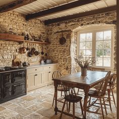 A farmhouse table and chairs in this English countryside kitchen create a welcoming and comfortable dining space Cottage House Kitchen, Comfy Cozy Home, Shabby Chic Farmhouse Decor, Chic Farmhouse Decor, Chic Living Room Decor, Country Cottage Kitchen, Cottage Retreat, Country House Interior