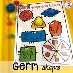 a close up of a piece of paper with shapes on it and the words germ shapes