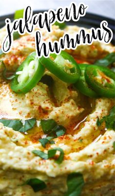 hummus with jalapeno peppers on top and the words jalapeno hummus above it