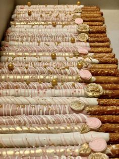 rows of pink and gold donuts lined up