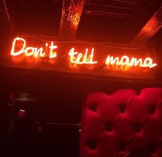 a neon sign that says don't tell mono