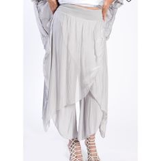 Beautiful Light Grey Silk Wrap Pants. Extremely Flattering And Very Comfortable. Features Stretchy Elastic Waistband For Comfortable Fit. Versatile Stretch Harem Pants For Spring, Versatile Harem Pants For Spring, Versatile Spring Bottoms, Versatile Non-stretch Harem Pants For Spring, Solid Color Elegant Harem Pants For Spring, Elegant Solid Harem Pants For Spring, Chic Stretch Harem Pants For Spring, Elegant Harem Pants With Elastic Waistband For Summer, Elegant Summer Harem Pants With Elastic Waistband