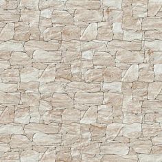 a stone wall that looks like it has been made out of rock and is beige