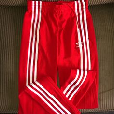 Adidas Originals Track Pants. Brand New, Never Worn. Tighter Fit In The Legs. Price Is Firm! Matching Jacket Is Also On My Shop! Adidas Flared Pants, Red Fitted Sweatpants For Athleisure, Sporty Red Pants With Side Stripes, Adidas Red Bottoms For Spring, Adidas Red Casual Bottoms, Red Adidas Bottoms For Spring, Red Casual Adidas Bottoms, Red Fitted Casual Sweatpants, Adidas Fitted Sweatpants