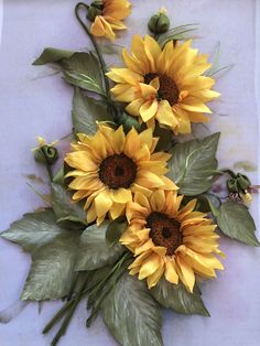 a bouquet of sunflowers on a white table cloth