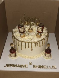 a cake with jams on it sitting in a box