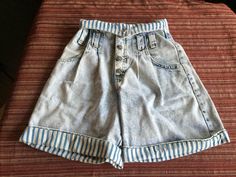 "Hard to find denim jean shorts with blue and white stripe cuffs and fold down waist. Size 3-4 or Extra Small. From a USA company called Bonnie. They're 17\" long, and have a 24\" waist. The last photo shows them with the waist not folded down. They have big pockets, and they have a zipper in the front (the buttons are just decorative in front of the zipper), but two functional buttons at the waist itself, above the zipper. Please take a look at my storefront at: https://www.etsy.com/shop/FabFin Casual Striped Denim Shorts, Casual Striped Denim Jean Shorts, Striped Denim Shorts, Alien Clothes, Unique Jeans, High Waist Short, Short Jean, Pink Dress Casual, Pink Summer Dress