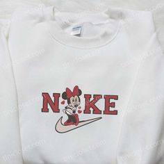 Nike x Minnie Mouse Loves Embroidered Sweatshirt, Disney Plus Embroidered Shirt, Best Gift Ideas For All Occasions Nike Cartoon, Disney Character Shirts, Nike Inspired, Nike Embroidery, Mickey Mouse Design, Walt Disney Characters, Kitty Accessories, Embroidered Shirts, Mickey Mouse Head