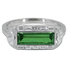 Art Deco Emerald Ring With Baguette Cut Center Stone, Art Deco Emerald Ring In Baguette Cut White Gold, Art Deco Platinum Emerald Cut Emerald Ring, Art Deco Emerald Ring With Baguette-cut Diamond, Art Deco Emerald Ring With Baguette Diamond, Gia Certified Baguette-cut Emerald Platinum Ring, Gia Certified Platinum Emerald Baguette Ring, Gia Certified Baguette Cut Emerald Platinum Ring, Platinum Emerald Ring With Polished Finish