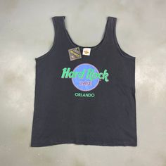 VINTAGE 90s Hard Rock Cafe Orlando Sleeveless Tank T-Shirt sz Large Men Adult CONDITION : Wear and fading from age. No stains or holes. Overall good condition ! *This shirt has been washed - Please review pictures* TAGGED SIZE : ** Adult Mens XL** ( Fits : Mens L ) MEASUREMENTS : *Please see photos above for measurements. *Disclaimer: All measurements are in inches and are taken laying flat on the ground* *Please review pictures, condition and refer to measurements before purchasing for a more a Large Man, Rock Cafe, Hard Rock Cafe, Sleeveless Tank, Hard Rock, Orlando, Vintage 90s, Tee Shirts, Mens Shirts