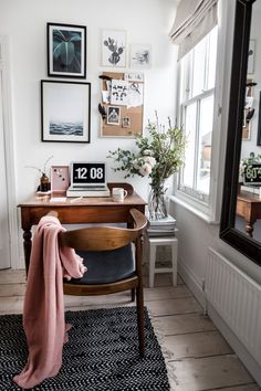 the instagram page shows an image of a room with pictures on the wall and a desk