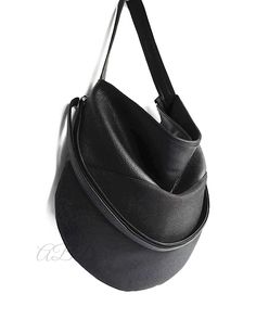 "Black hobo bag Black handbag Black vegan bag Large shoulder bag Slouchy hobo purse Slouchy hobo bag Hobo purse bag Handbag women Bag woman Cross body bag Cross body purse Vegan purse black Black bag large This is a comfortable and capacious bag. Women handbag.Its simple and functional character allows you to fit everything you need inside throughout your entire day. It is voluminous yet neat, making it a great addition to a loose fitting and elegant clothing. This vegan purse bag is made for wo Versatile Black Hobo Bucket Bag, Black Canvas Hobo Bag For Daily Use, Versatile Black Hobo Bag, Modern Hobo Bag With Adjustable Strap, Versatile Black Handheld Hobo Bag, Black Handheld Hobo Bag For Errands, Black Hobo Bag With Large Capacity, Black Hobo Bucket Bag For Daily Use, Black Hobo Shoulder Bag With Adjustable Strap