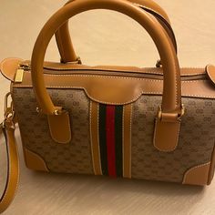 Gucci Vintage Handbag Never Used With Bag. Gucci Rectangular Satchel For Evening, Rectangular Gucci Satchel For Evening, Gucci Satchel With Detachable Strap For Travel, Gucci Rectangular Evening Satchel, Gucci Handheld Shoulder Bag For Formal Occasions, Gucci Formal Handheld Shoulder Bag, Formal Gucci Handheld Shoulder Bag, Gucci Handheld Shoulder Bag, Classic Gucci Tote Shoulder Bag