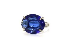 >Crafted in 14k gold-fill, this gorgeous and vibrant cocktail ring exudes elegant vibrance with its large, oval Sapphire stone. A large ring that will stylishly go with your looks, both casual and for special occasions. A statement jewelry and an awesome gift choice for a special lady. ☛ 𝒜𝐵𝒞 - Add Engraving - https://etsy.me/2ZSRjhu ☛ Ring size - Select the size you would like from the drop down menu ♥ Gemstone Type - Sapphire (Lab Created) ♥ Gemstone Size - 16x20mm ♥ Gemstone Cut - Facete Silver Sapphire Ring, Oval Sapphire Ring, September Birthstone Rings, September Birthstone Jewelry, Fancy Gifts, Versatile Jewelry, Textured Ring, Gem Ring, Large Ring