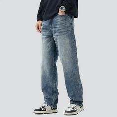 Elevate your trend game with our sanded men's medium-wash jeans from the 2023 Autumn-Winter Collection! These vintage-inspired jeans are the epitome of fashion, with their baggy fit and whiskered details. The high-waistline design adds a touch of sophistication, while the zipper and button closure provide a vogue twist.Distinctive Features Fashion Forward: These jeans exude style and elegance, making them a must-have in your wardrobe. They capture the essence of the 2023 vogue vibes and are a pe Winter Medium Wash Rigid Denim Jeans, Washed Blue Straight Leg Jeans For Winter, Winter Straight Leg Washed Blue Jeans, Winter Washed Blue Straight Leg Jeans, Washed Blue Relaxed Fit Jeans, Washed Blue Relaxed Fit Jeans For Winter, Winter Relaxed Fit Washed Blue Jeans, 2023 Vogue, Statement Jeans